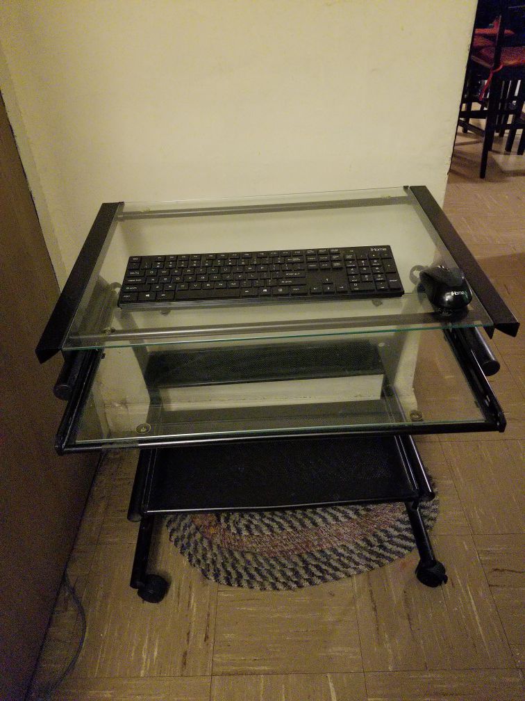 Glass computer desk with wireless ihome keyboard and mouse