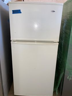 Amana top and bottom refrigerator working perfectly with 4 months warranty