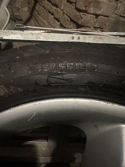 BMW Rim And Tire Defender) 215/55/17 Low Profile 
