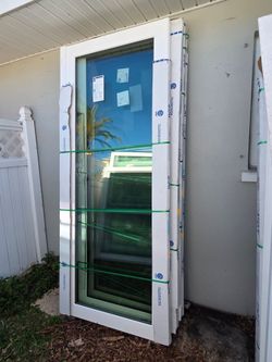 Brand New 80W x 96H PGT Impact sliding door with Frame