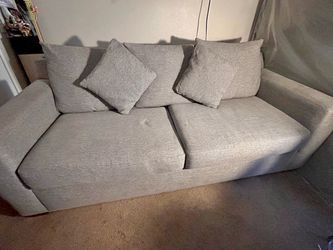 Gray sofa and love seat