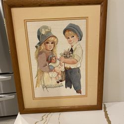 Hand Embroidered Boy and Girl matted on wood frame