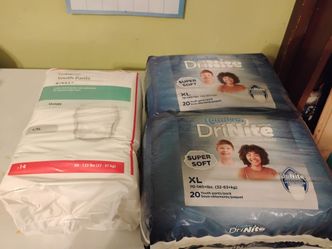 Several packs of pull ups size xl