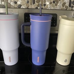 2 Owala and 1 TAL stainless steel insulated tumblers