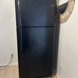 Free black Frigidaire top-freezer refrigerator