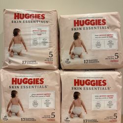 4 packages Huggies size 5 Diapers