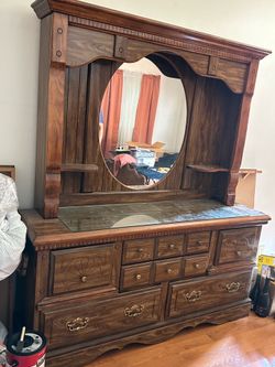 Chest of drawers and mirror