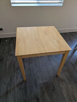Wooden extendable table + chairs