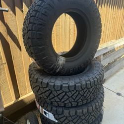 **NEW** Ridge Grappler 285/70r17 Tire