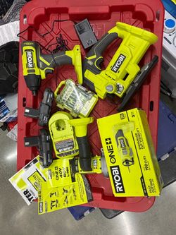 Set of Ryobi power tools and charger
