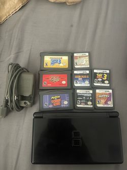 Nintendo ds lite with 8 games/open to trades