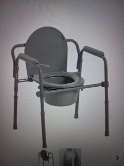 Drive medical steel folding bedside commode.