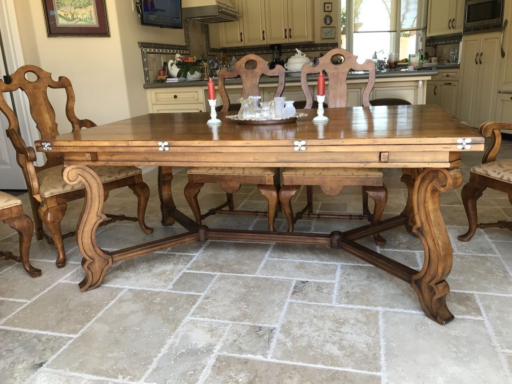 Convertible Carved Trestle Dining Table by Century Furniture. Seats 6 or expands to seat 12.