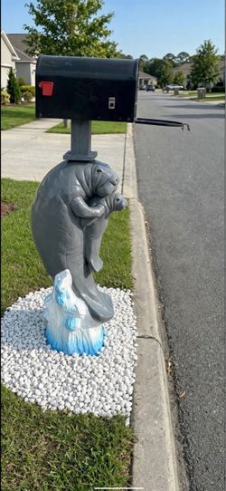 Solid concrete manatee mailbox/ free delivery and installation on Saturday