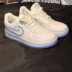 Nike Air Force 1 White Leather Sneakers with Blue Accents