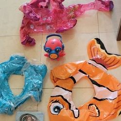 Kids beach toys and 4 floating and 1 Octopus bubble machine and 2 swimming suit 