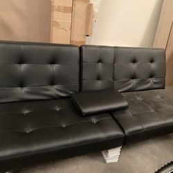 Black faux leather sofa bed