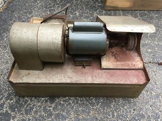 Metal polisher with precious metal collector.