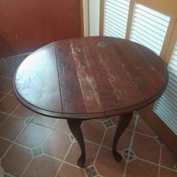 Antique Oval Drop Leaf Table.  $185.  (OBO)