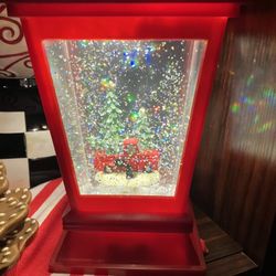 Light up dome with red truck and snow