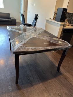 Preowned Brown Wooden Dining Table 