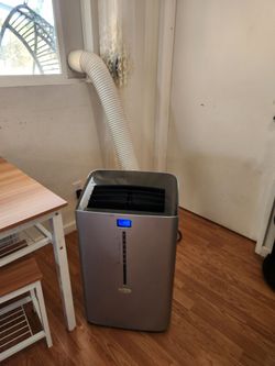Portable Ac With Hose/ Window Kit/ blows ice cold air fast/ can test before buying/ cools down my living room and kitchen fast