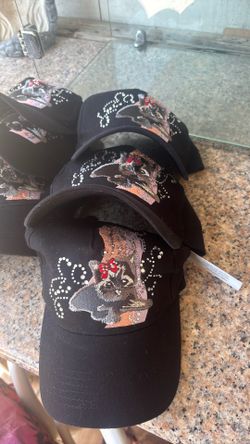 Black hat with rinestones on it