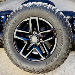 Like New 2025 18” Silverado 1500 Trail Boss Black OEM Wheels on 33” Tires 95% Tread