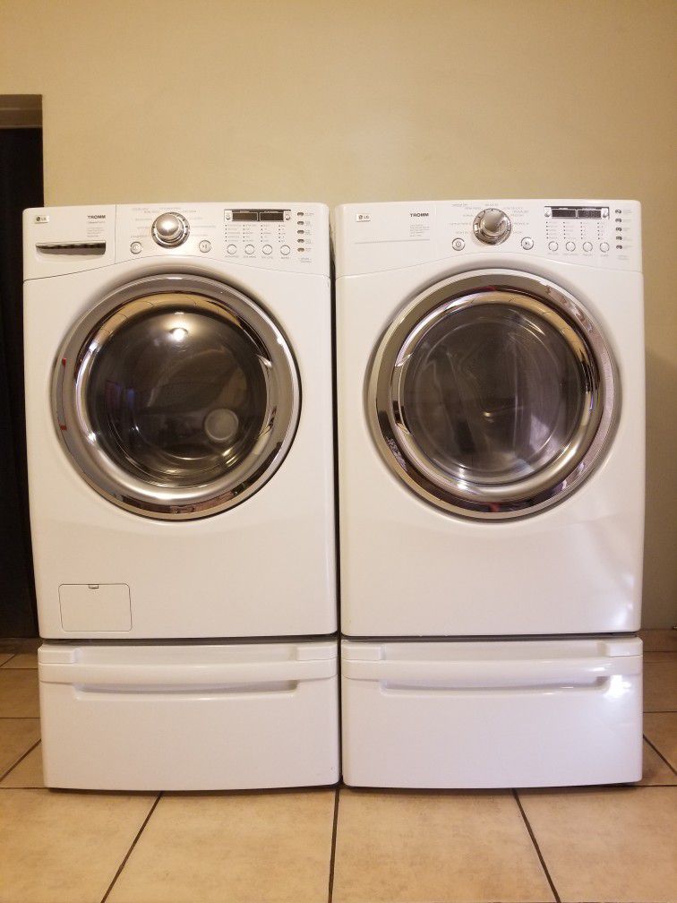 ELEGANT LG WASHER AND ELECTRIC DRYER FREE DELIVERY AND INSTALLATION ALSO A 90 DAYS WARRANTY 