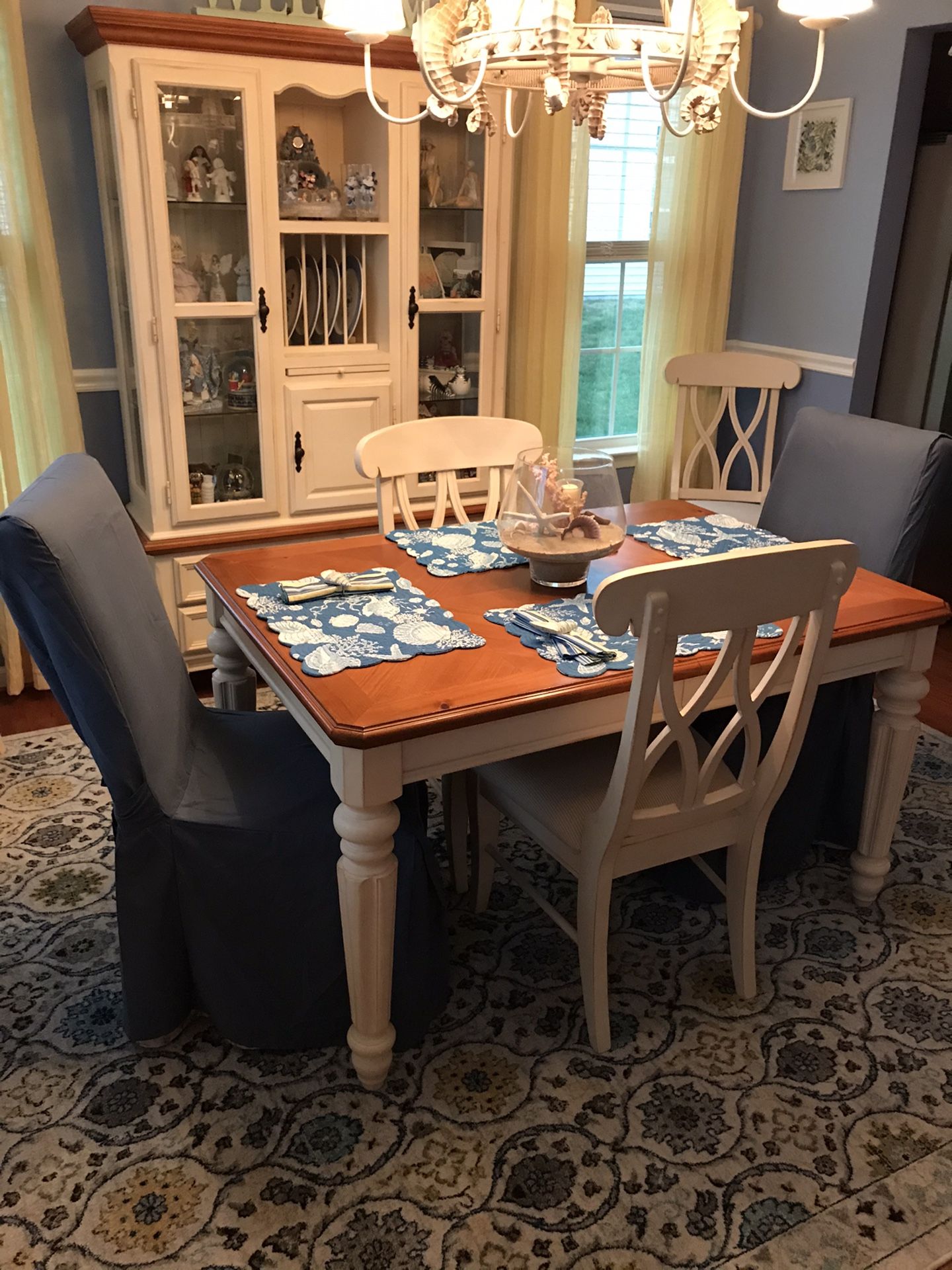 Dining table with leaf carved legs and 6 chairs