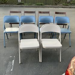 10 Folding Chairs(4)Wood W/Cushion(4)Metal W/Cushion(2)Metal W/O Cushion. Still In Good Condition & Useable 