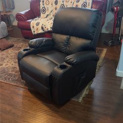 Black Lounge Chair It Swivels It Rocks It Opens Up To Lay Down Excellent Condition. Brand New Paid 500 For It Asking 250.