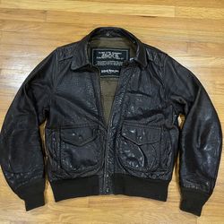 Schott brown leather bomber jacket with multiple pockets 