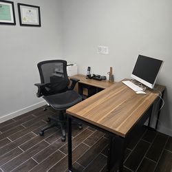 L shaped desk with chair.