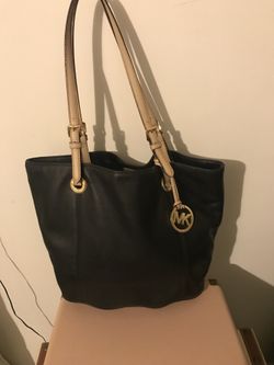 Mk bag Medium size!!! And yes it’s authentic