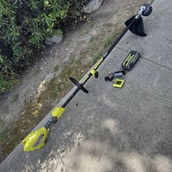 RYOBI 40V 15 in. Expand-It Cordless Battery Attachment Capable String Trimmer with 4.0 Ah Battery