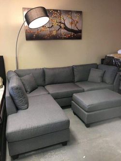 Brand new reversible sectional sofa with free ottoman