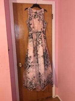 Women’s size 14 long dress .new with tags $160or best offer ..Eliza brand.negotiable