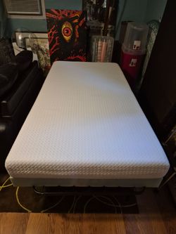 Nice Used Excellent Condition Twin Mattress and foam mattress.