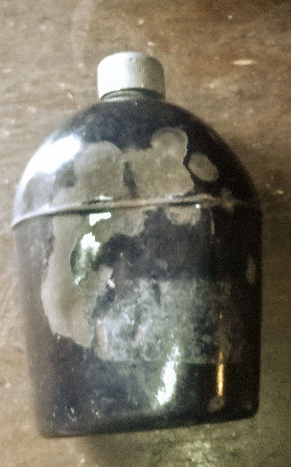 A Very Well Old 1942 US Army Black Porcelain Canteen
