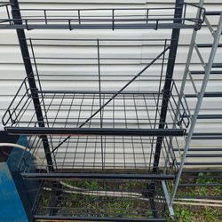 Metal Rack With 5 Shelves Like Baskets And Wheels Like New No Rust At All 
