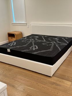 King Size Mattress Pillow Top 12"    new Mattress in a plastic sealed.  We offer same day delivery