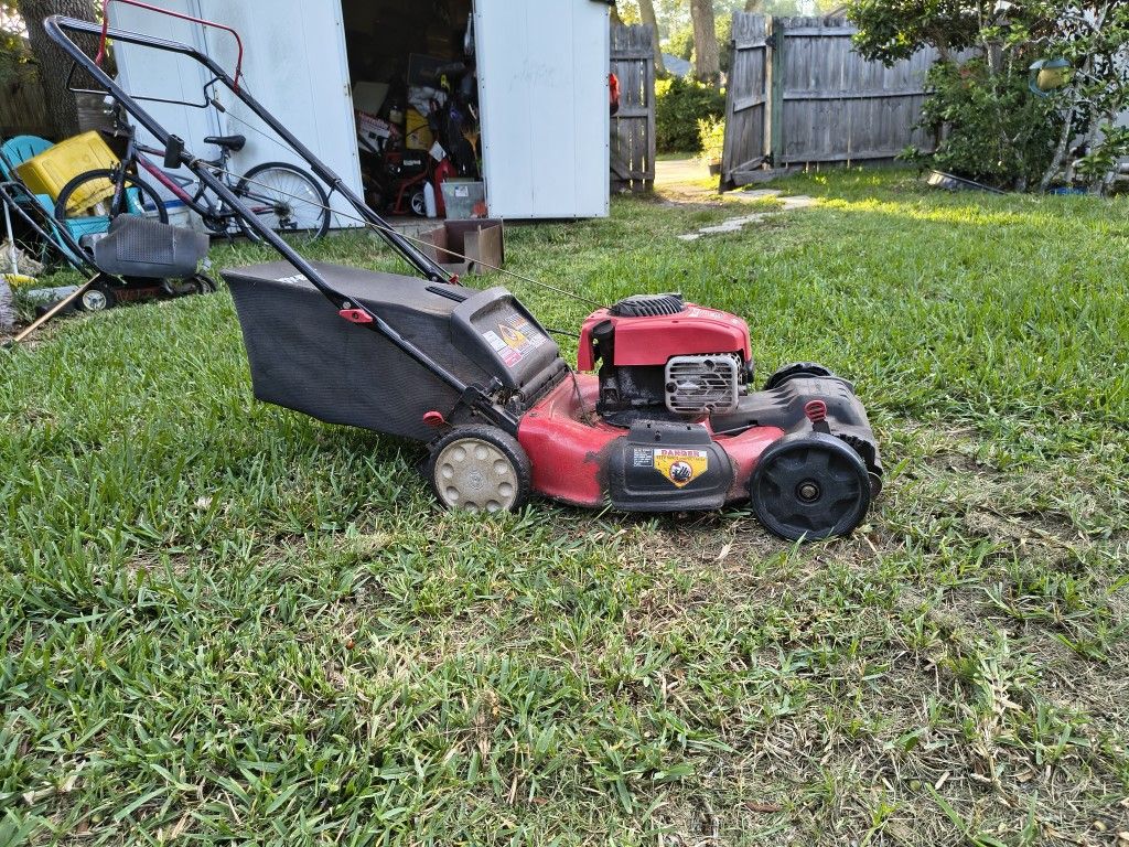 21" Toro Self-propeled Lawn Mower. With Bag. Front Tires A Little Worn But The Old Girl Runs Like A Banshee!!$33.00obo. 