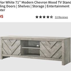 Modern entertainment center in excellent condition, only 2 months old.