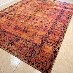9’ x 12’ Reg and orange Safavieh area rug