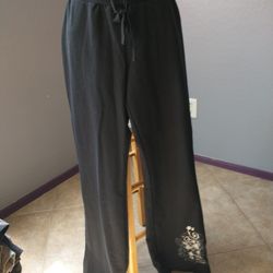 Black drawstring pants with floral accent size small
