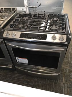 FRIGIDAIRE GALLERY SLIDE IN GAS RANG STAINLESS STEEL NEW SCRATCH AND DENT