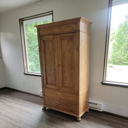 Handmaid wooden hutch.