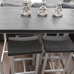 Black And Silver Table With 4 Stools