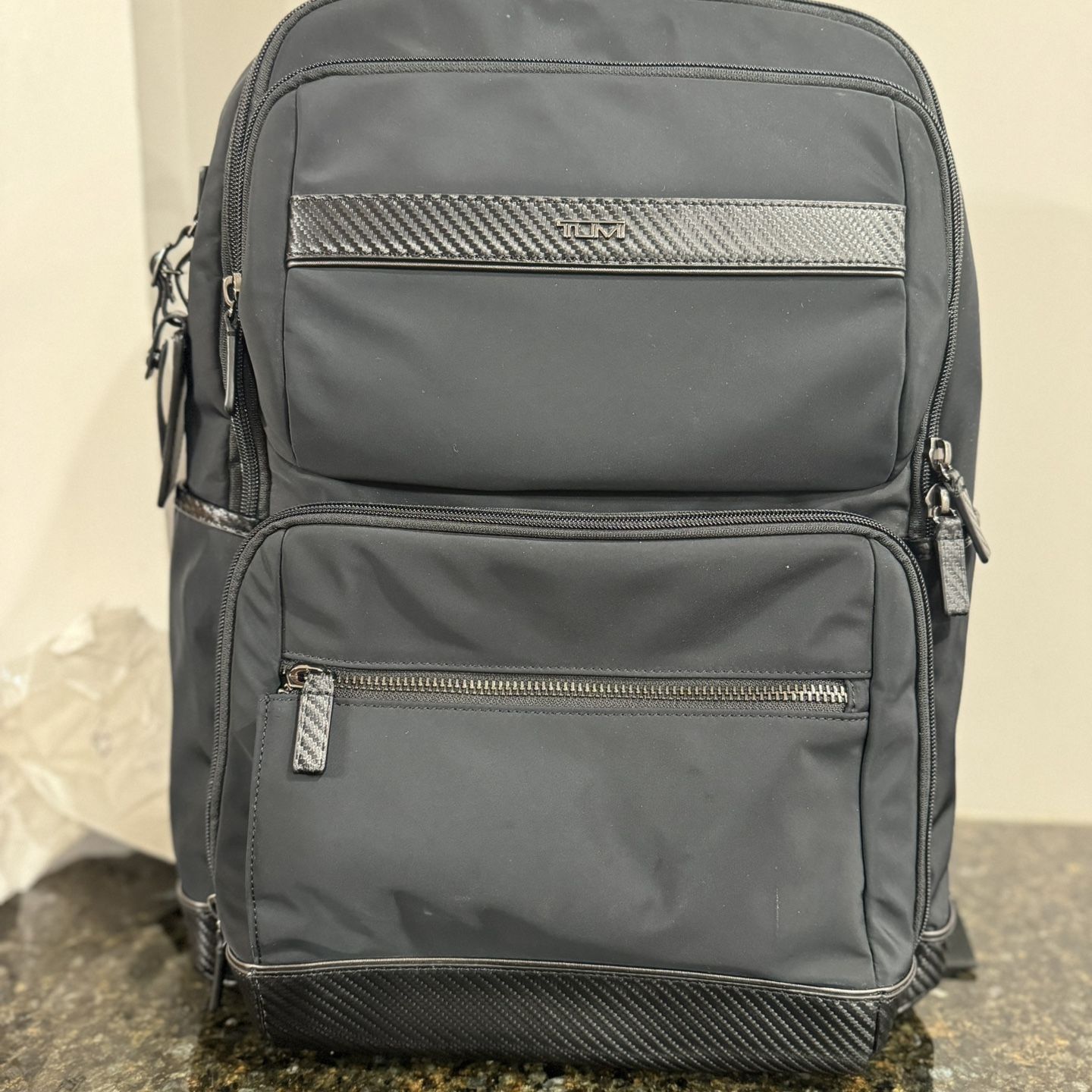 tumi alvington backpack Voyageur Atlanta Black / Gold Exterior Features This backpack has a zip entry to the main compartment a top carry handle with leather accents top U TUMI Dalston Alvington $172.5 11175_,